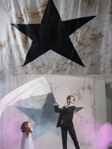 8x10 Black star fabric backdrop available for rental. Photo by Toma Kostygina