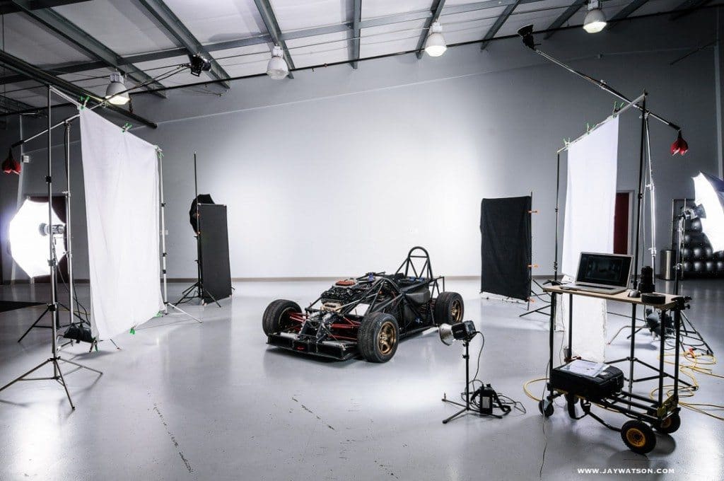 a race car inside a photo studio a race car inside a photo studio
