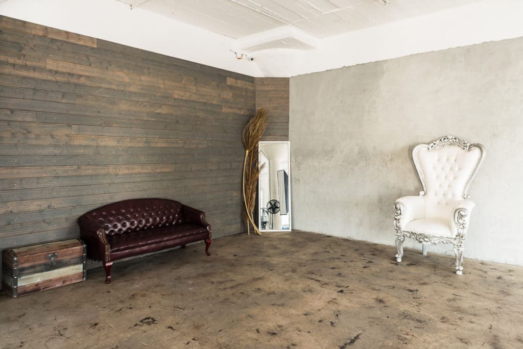 natural light photo studio with white staircase