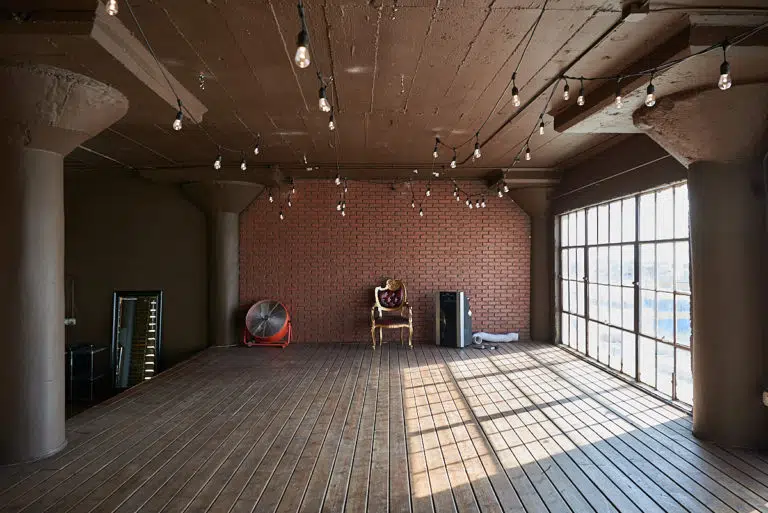 Wooden stage with LED lamps available for photo and video rental in Los Angeles