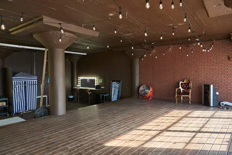 Wooden stage with LED lamps available for photo and video rental in Los Angeles