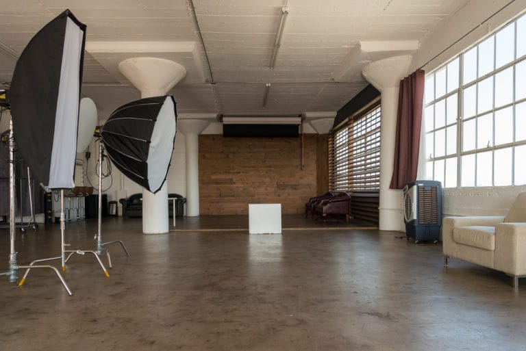 Stage with a wooden corner, large blinds and a marquee star available for rental in Los Angeles Stage with a wooden corner, large blinds and a marquee star available for rental in Los Angeles
