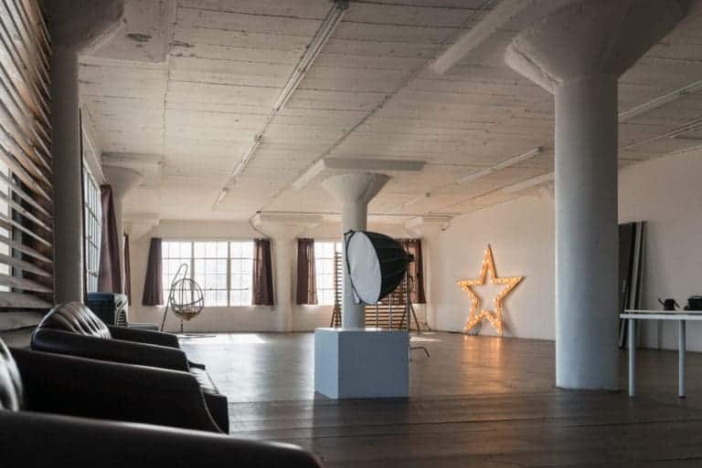 Stage with a wooden corner, large blinds and a marquee star available for rental in Los Angeles Stage with a wooden corner, large blinds and a marquee star available for rental in Los Angeles