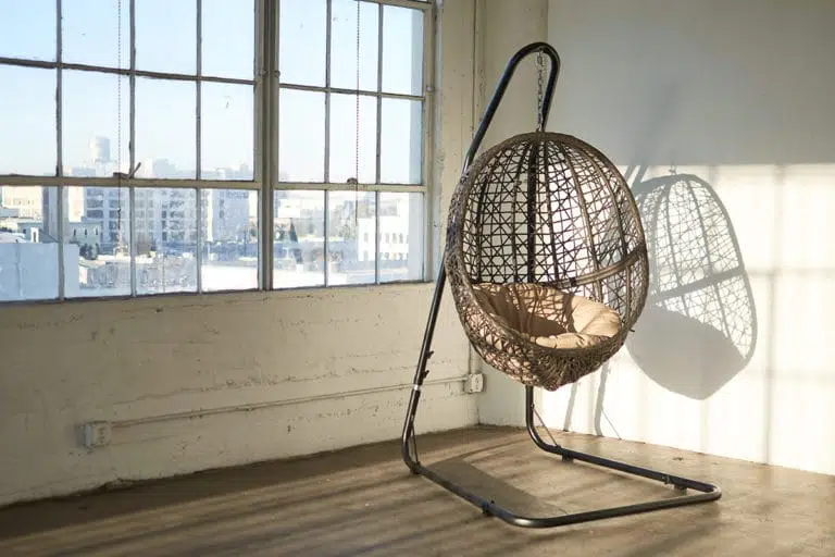 Stage with a wooden corner, large blinds and a marquee star available for rental in Los Angeles