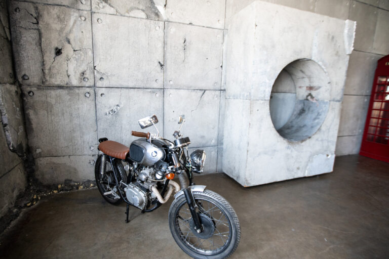 Hill 8 - concrete wall, bike, neon wall photo studio in LA Hill 8 - concrete wall, bike, neon wall photo studio in LA