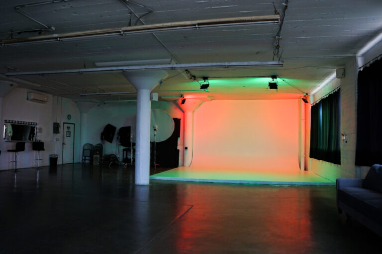 Daylight photo studio for rent in Los Angeles with a white cyc wall and RGB lights_Studio C