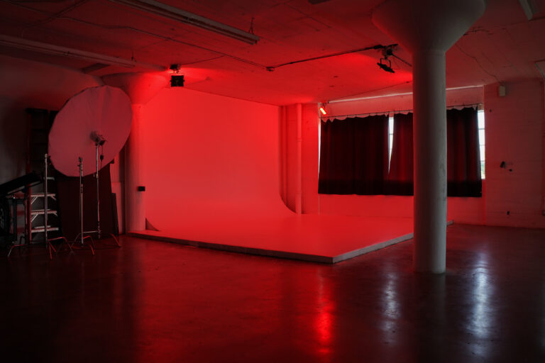 Daylight photo studio for rent in Los Angeles with a white cyc wall and RGB lights_Studio C_01