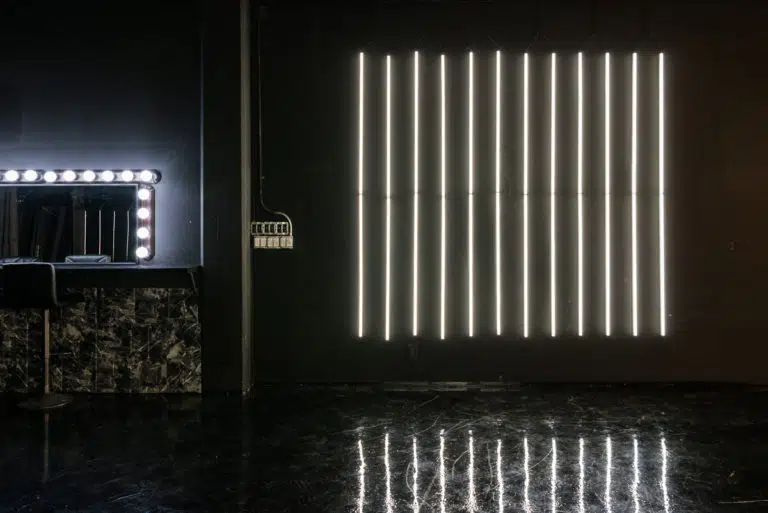 LED dimmable lights & black glossy floor blackout stage is available for photo and video rentals in Los Angeles