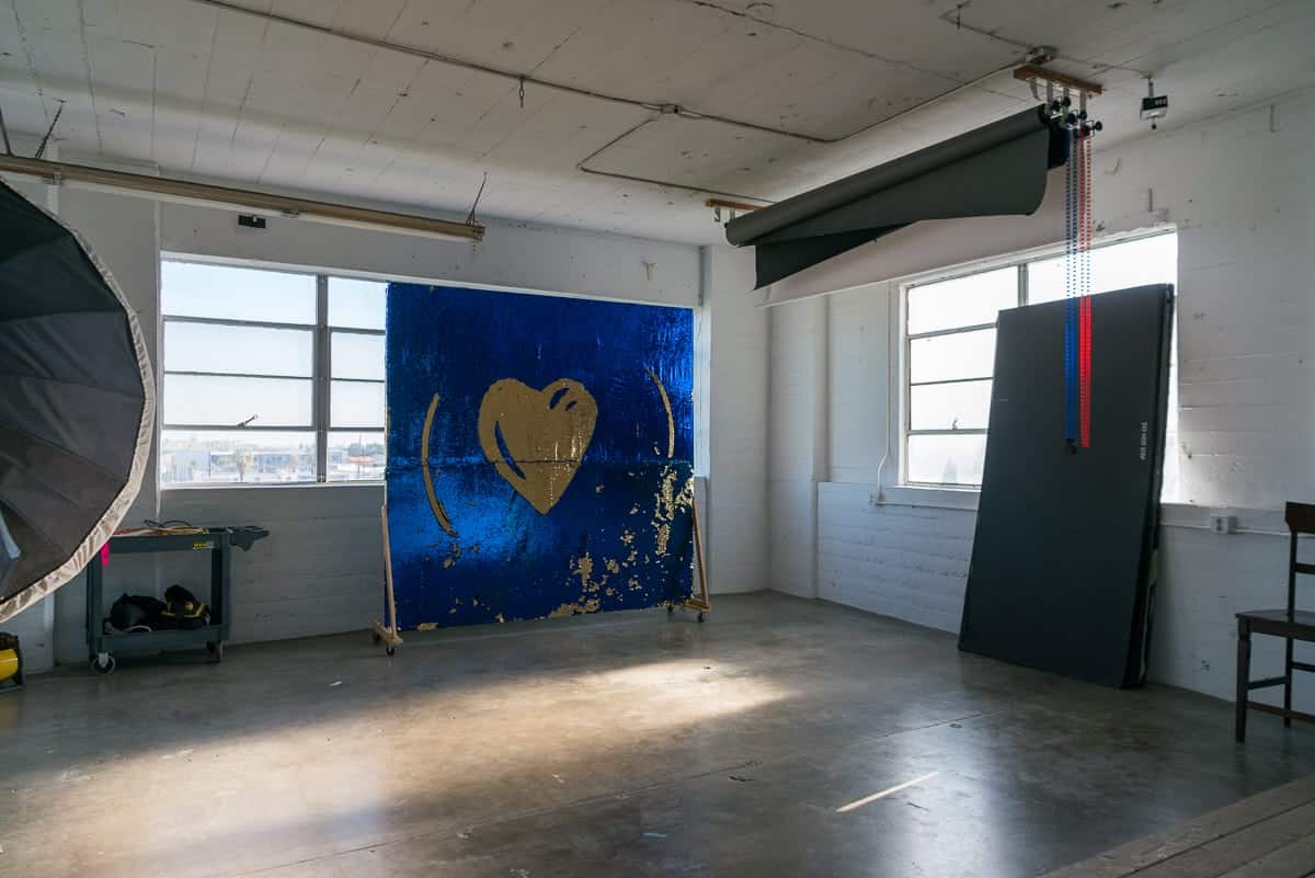 gold and royal blue sequin backdrop available with Stage C rental