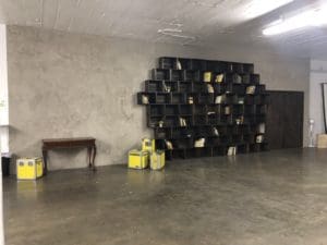 Stage UPGRADE:  Textured walls, dark stained shelves & cool props in stage D! -textured wall, textured door, Studio News, stage update, Shoot Location, set design, Rental Studio, Renovation, Photoshop, Photoshoot, photography services, photographer, Photo Studio, new stage, natural light studio, Main location, Los Angeles, Filming Location, film canisters, FD photo studio, DTLA, dark stained wooden shelf, ambient light studio, !done