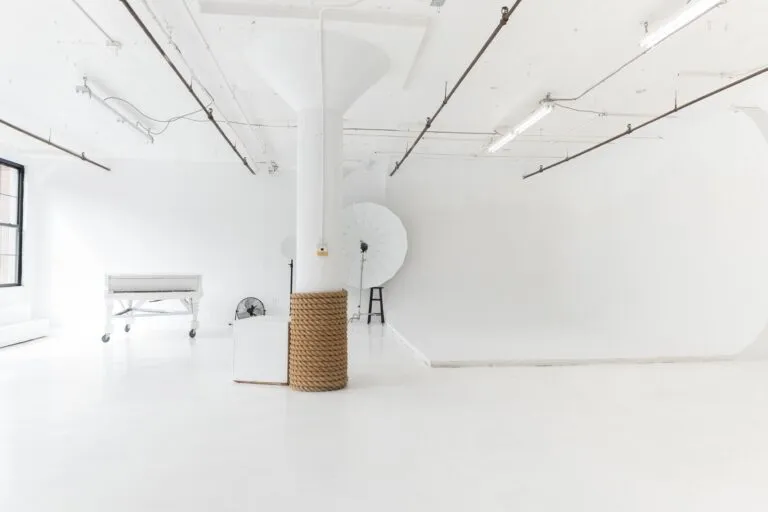 LIC 1 - photo studio with cyc wall, west-facing windows, lots of natural light, and white floors in NY