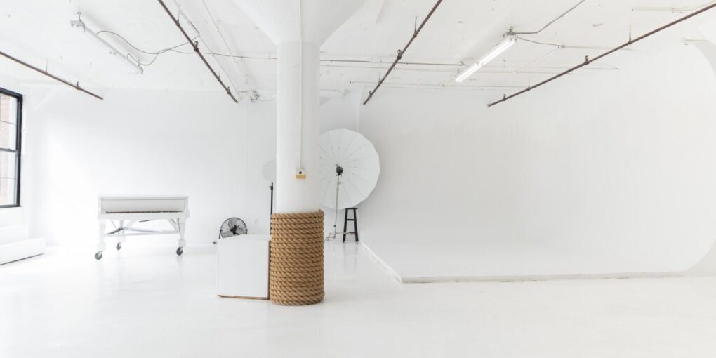 LIC 1 - photo studio with cyc wall, west-facing windows, lots of natural light, and white floors in NY
