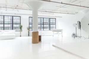 LIC 1 - photo studio with cyc wall, west-facing windows, lots of natural light, and white floors in NY LIC 1 - photo studio with cyc wall, west-facing windows, lots of natural light, and white floors in NY