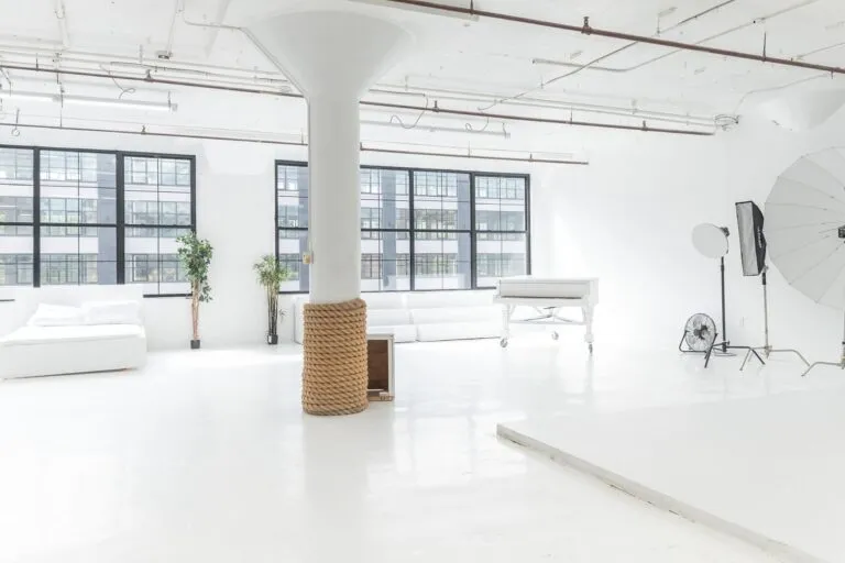 LIC 1 - photo studio with cyc wall, west-facing windows, lots of natural light, and white floors in NY