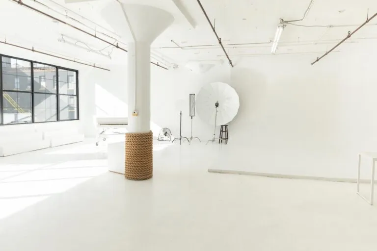 LIC 1 - photo studio with cyc wall, west-facing windows, lots of natural light, and white floors in NY