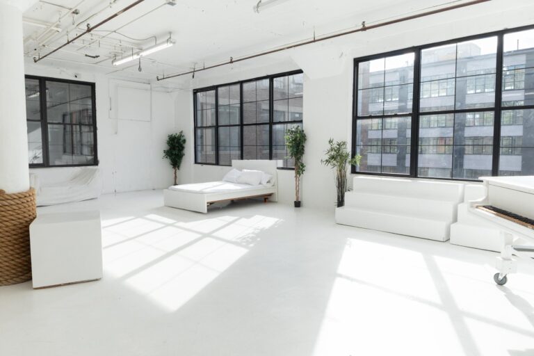 LIC 1 - photo studio with cyc wall, west-facing windows, lots of natural light, and white floors in NY LIC 1 - photo studio with cyc wall, west-facing windows, lots of natural light, and white floors in NY