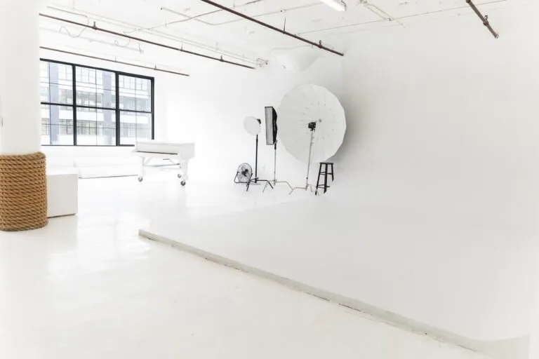 LIC 1 - photo studio with cyc wall, west-facing windows, lots of natural light, and white floors in NY