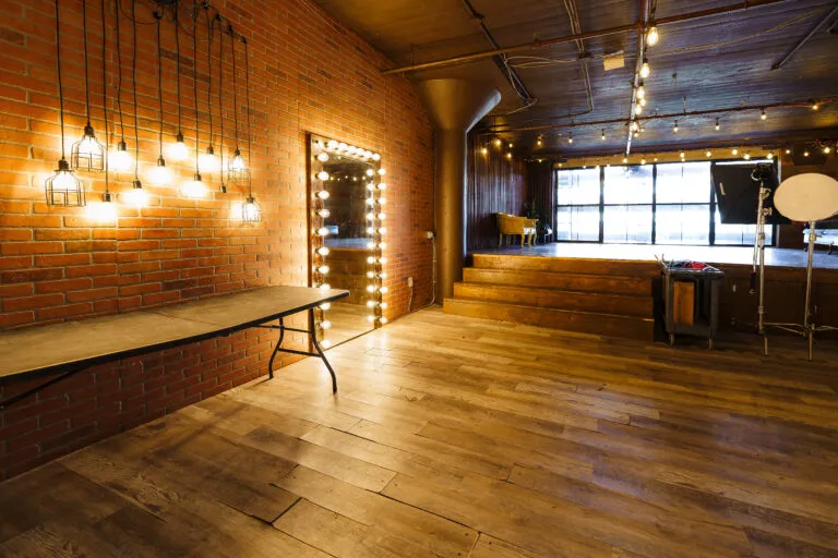 LIC 2 - daylight photo studio for rent near me with brick and wooden walls and floors in New York