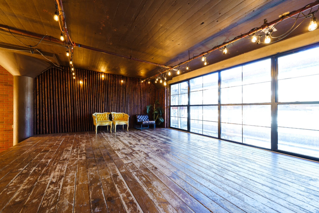 LIC 2 - daylight photo studio for rent near me with brick and wooden walls and floors in New York