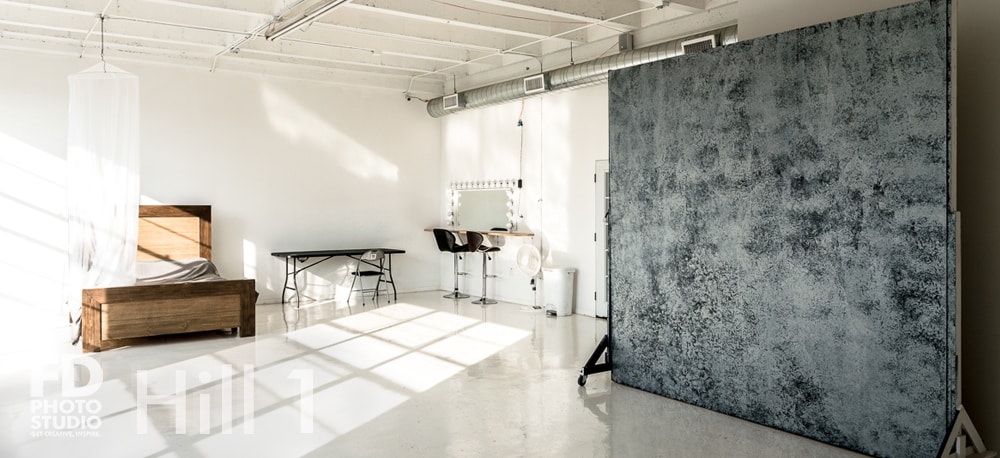 Natural light photo studio with high-gloss white floors available for rental in Los Angeles
