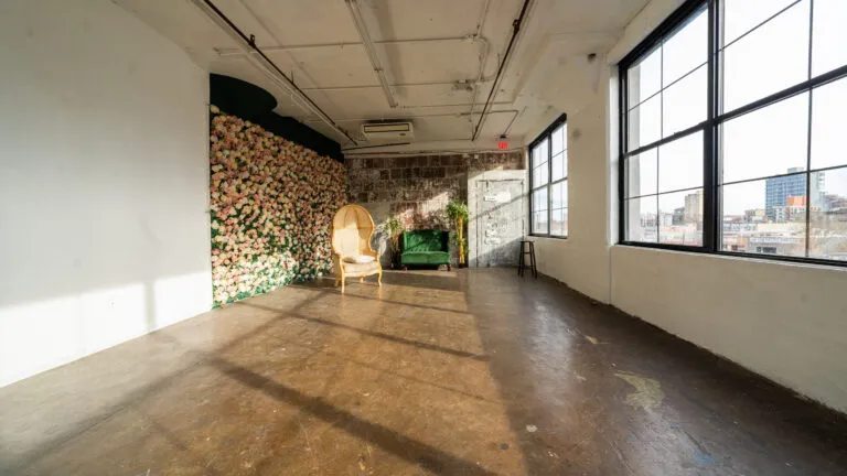 LIC 6 - photo studio with flower wall and exposed block wall in NY