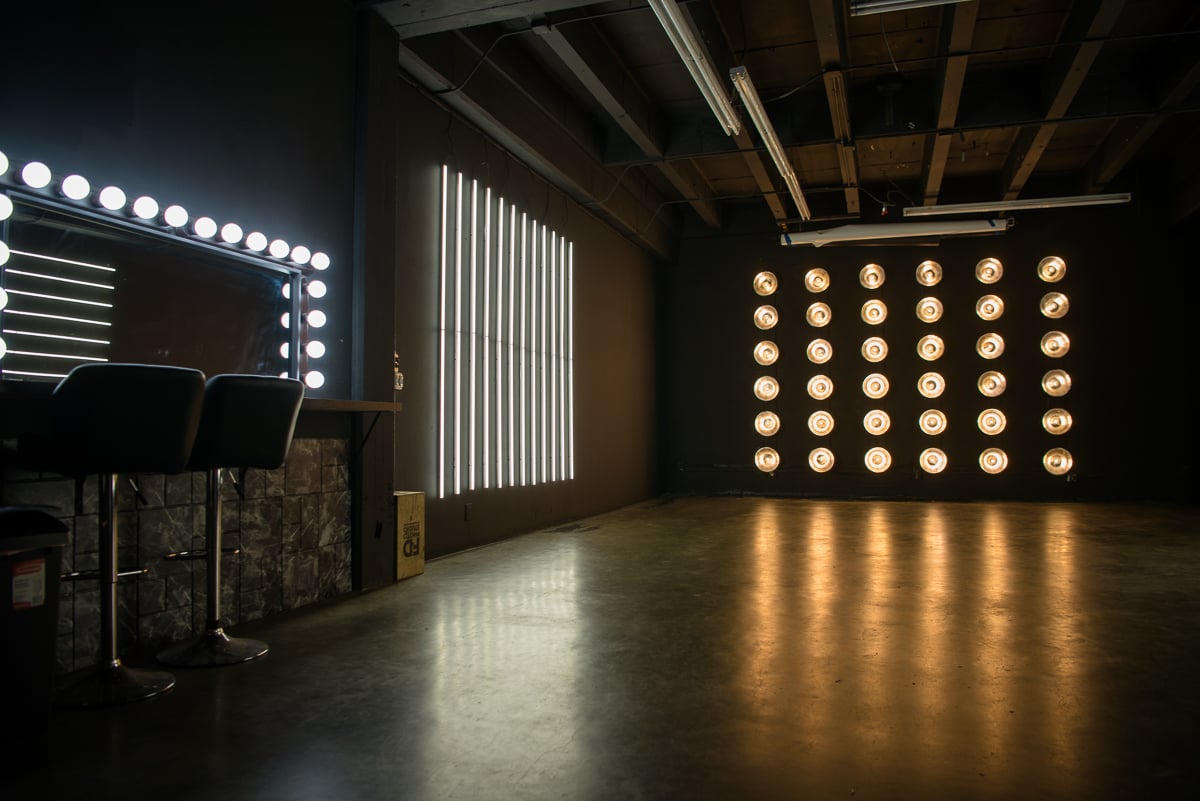 Black studio with LED dimmable lights available for photo and video rental in Los Angeles
