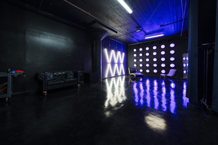 LIC 4 - a Blackout Studio for rent near me New York with RGB lights, X-lights, Concrete Wall, Black gloss floor and two different French Walls LIC 4 - a Blackout Studio for rent near me New York with RGB lights, X-lights, Concrete Wall, Black gloss floor and two different French Walls