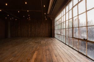 Stage Upgrade: WOOD PLATFORM in NYC studio 2! -wood platform, white industrial studio, Rent a Studio, Photostudio, Photography Studio, photographer, NY Studio 2, New-York City, New-York, lounge chair, Long Island, Hourly Studio Rental, Brooklyn, brick wall, Affordable