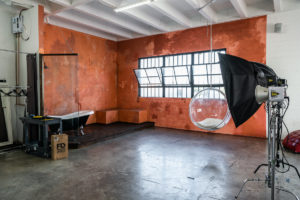 NEW PROPS: Grey Textured Fabric Backdrop in Studio Hill 6 -transparent egg-shaped hanging chai, Studio News, shower, Rental Studio, Renovation, red leather lounge chair, Photo Blog, moroccan tile shower corner, Los Angeles, LA Rental Studio, Hill Location, Hill 6, grey textured fabric backdrop, grass wall with white flowers, gloss floor, garland wall, FD photo studio, DTLA, Announcement