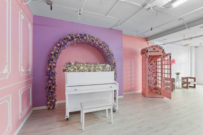 Astoria 3 - daylight photo studio for rent with pink walls and Christmas decorations in New York