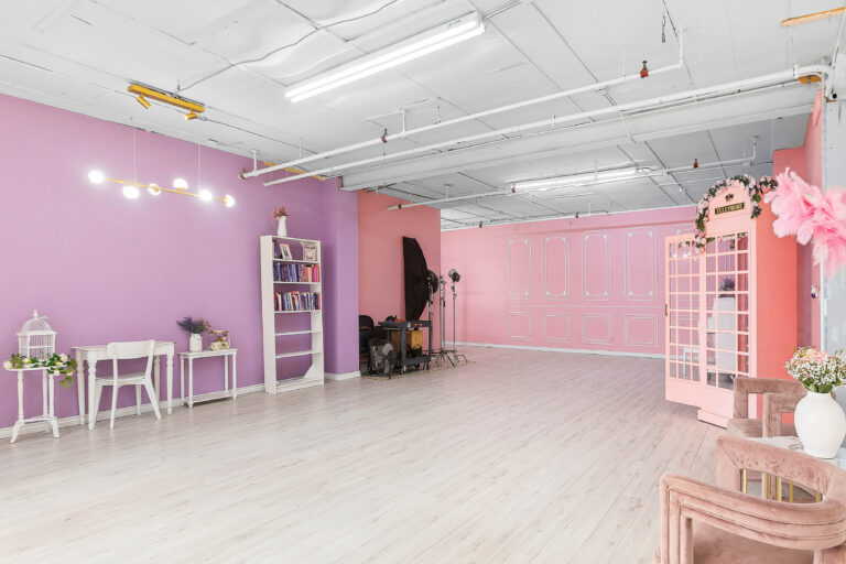 Rental photo studio with hardwood floors, big North facing window, and a pink photo booth - Astoria 3 Rental photo studio with hardwood floors, big North facing window, and a pink photo booth - Astoria 3