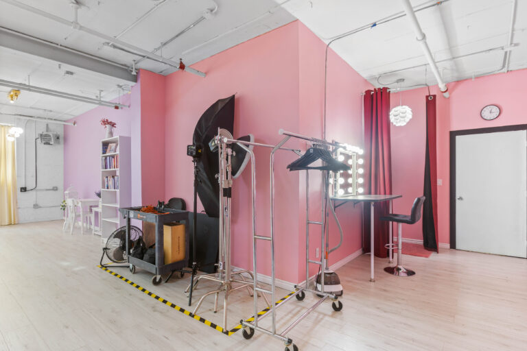 Rental photo studio with hardwood floors, big North facing window, and a pink photo booth - Astoria 3 Rental photo studio with hardwood floors, big North facing window, and a pink photo booth - Astoria 3