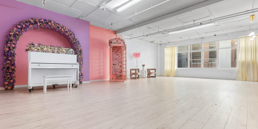 Astoria 3 – Rental Photo Studio with Hardwood Floors, Big North-Facing Window, and a Pink Photo Booth - FD Photo Studio