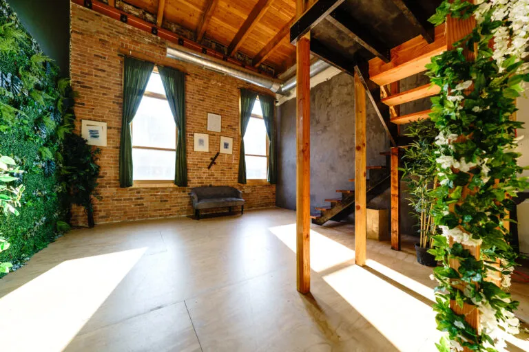 Beautiful daylight photo studio with Jungle & Concrete walls and Neoon Loft on the mezzanine near me Chicago 6