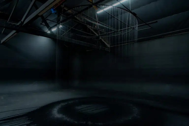 Circle rain feature on a black Cyclorama