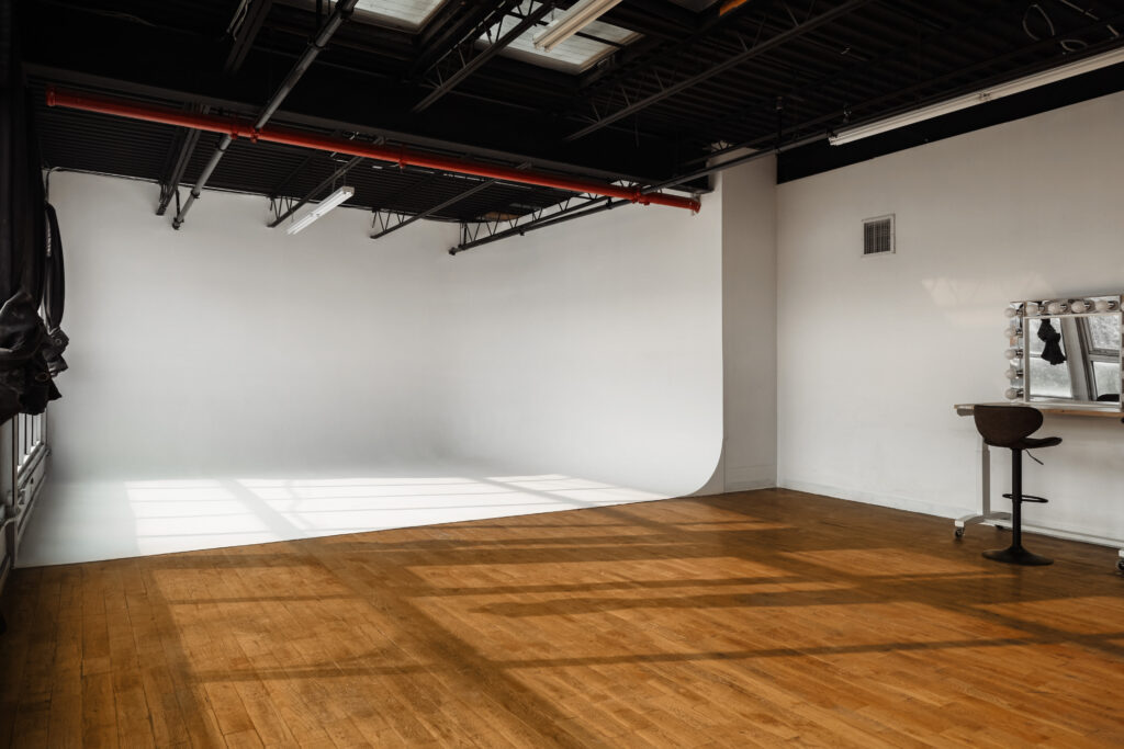 New Daylight Photo Studios with the Large Windows, Wooden Floors, Rooftop, and a Cyc Wall in  Brooklyn, NY. -