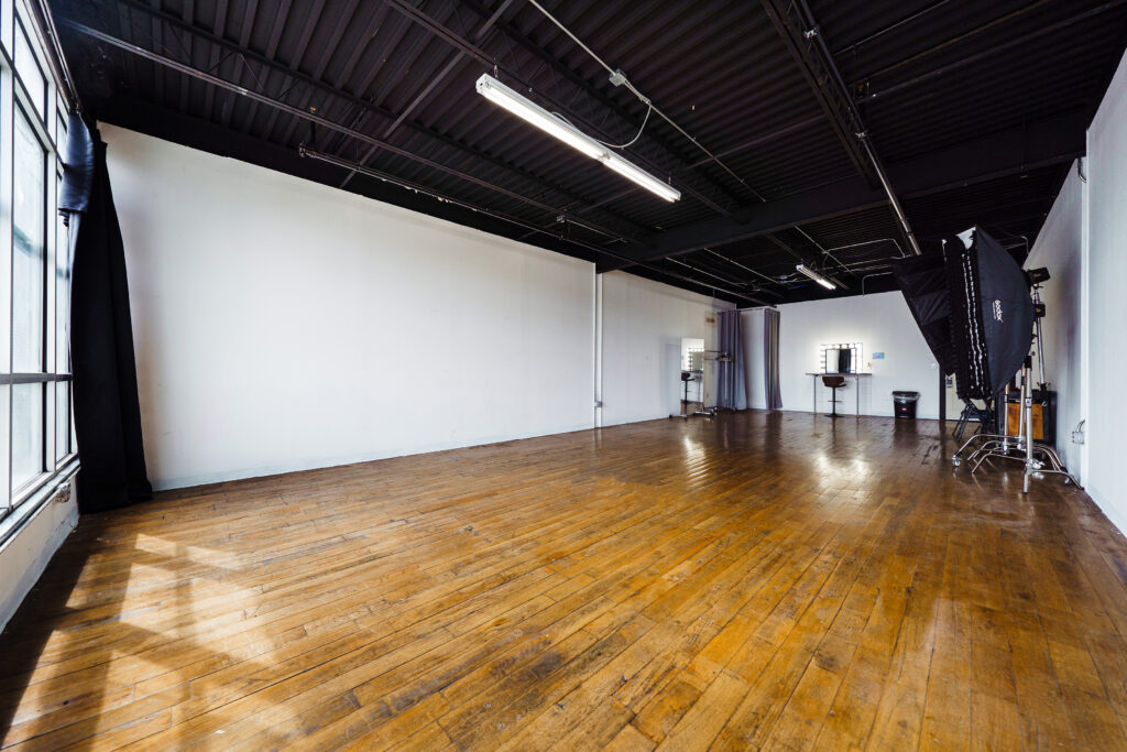 New Daylight Photo Studios with the Large Windows, Wooden Floors, Rooftop, and a Cyc Wall in  Brooklyn, NY. -