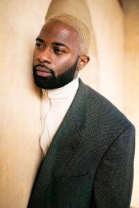 Darius in Hill 6 -Studio News, shower, Rental Studio, red leather lounge chair, Photo Blog, moroccan tile shower corner, Los Angeles, LA Rental Studio, Hill6, Hill Location, Hill 6, grass wall with white flowers, gloss floor, garland wall, FD photo studio, DTLA, Darius in Hill 6