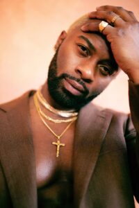 Darius in Hill 6 -Studio News, shower, Rental Studio, red leather lounge chair, Photo Blog, moroccan tile shower corner, Los Angeles, LA Rental Studio, Hill6, Hill Location, Hill 6, grass wall with white flowers, gloss floor, garland wall, FD photo studio, DTLA, Darius in Hill 6