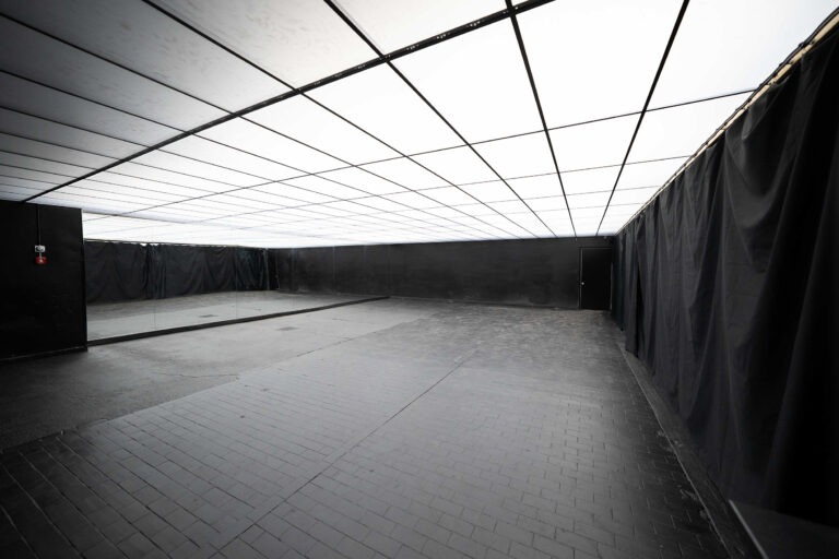 Photo & video studio for cars with drive-in access, Mirror walls on both sides, and fully controllable RGB Ceiling photo studio in New York