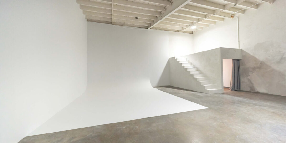 Cyc wall photo studio for rent with white steps yukon 2