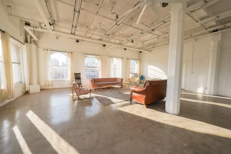 Daylight Photo studio for rent in Los angeles with arched windows and dt views