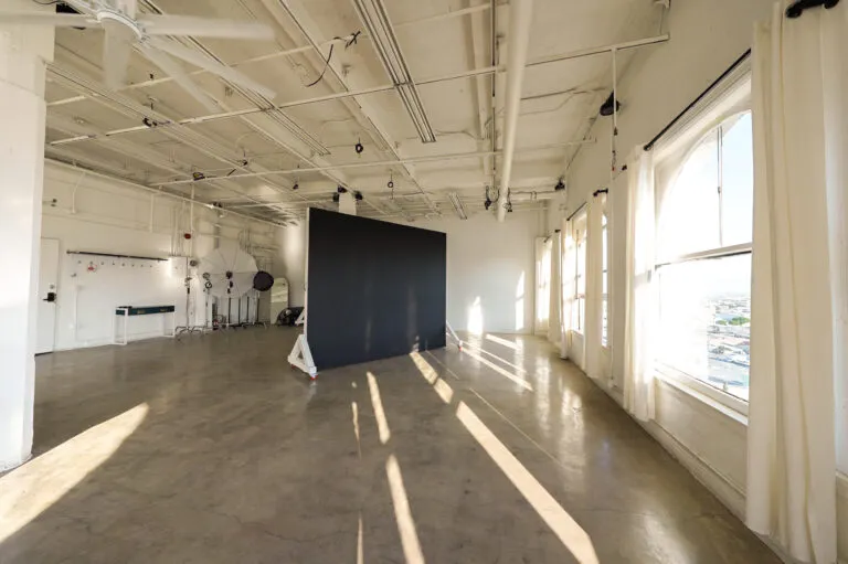 Daylight Photo studio for rent in Los angeles with arched windows and dt views