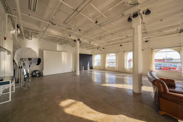 Daylight Photo studio for rent in Los angeles with arched windows and dt views