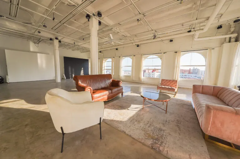 Daylight Photo studio for rent in Los angeles with arched windows and dt views