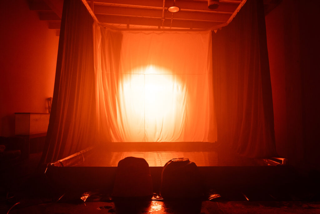 photo studio with a pool filled with water large curtains white walls in Los Angeles Yukon 3-9